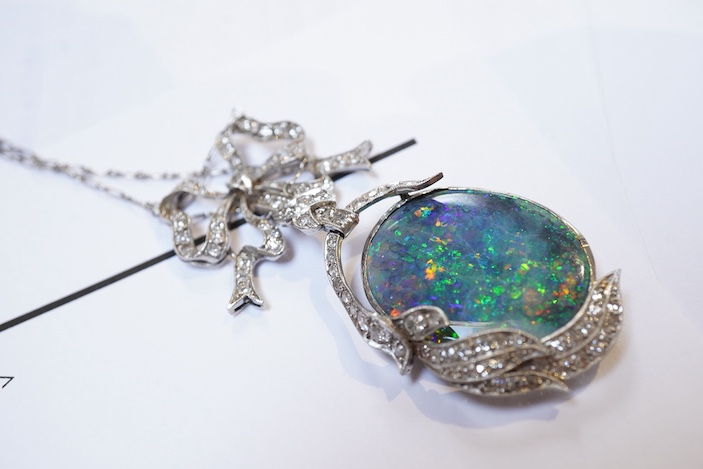 An impressive Belle Epoque black opal and diamond pendant, early 20th century